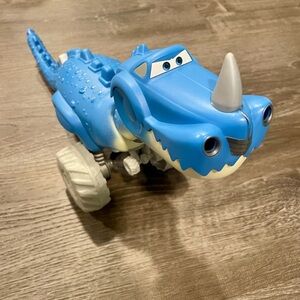 Disney Pixar Cars Chomp and Roll Dino